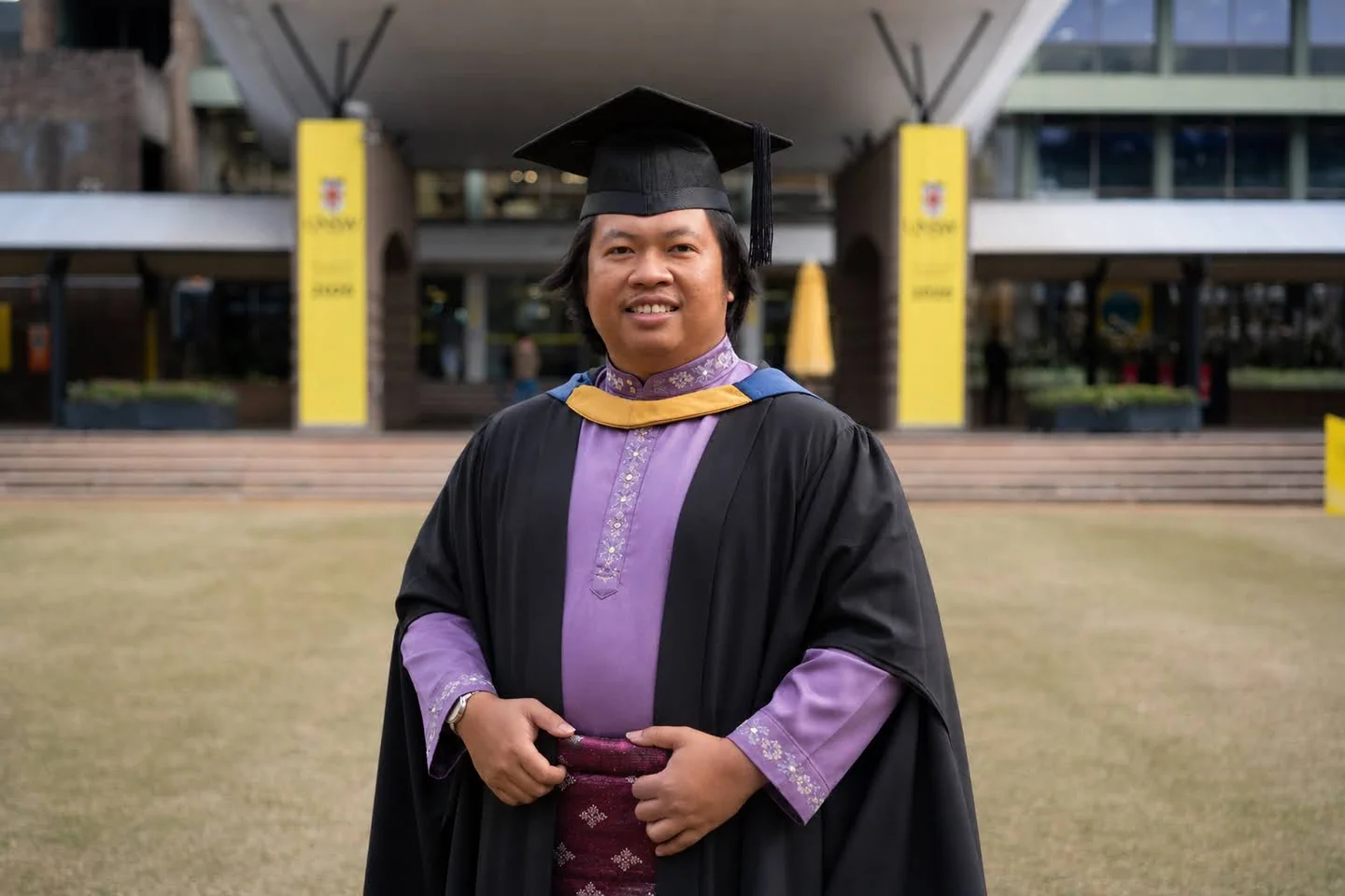 Riyan celebrating completion at UNSW